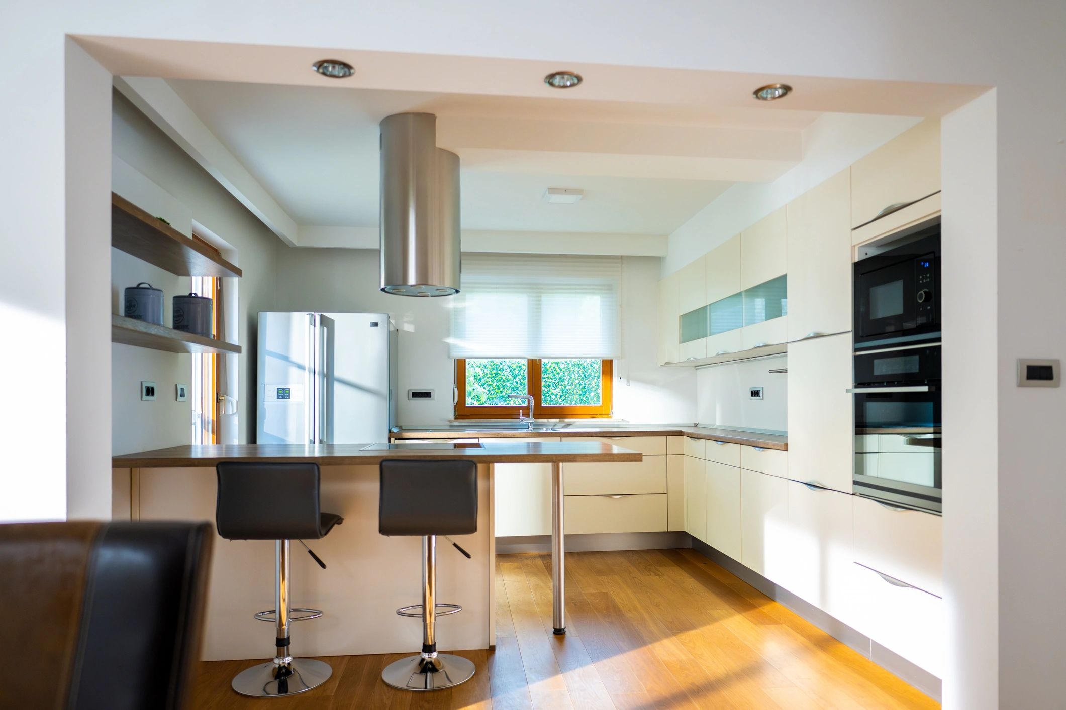 Modern kitchen with clean cabinetry and natural light