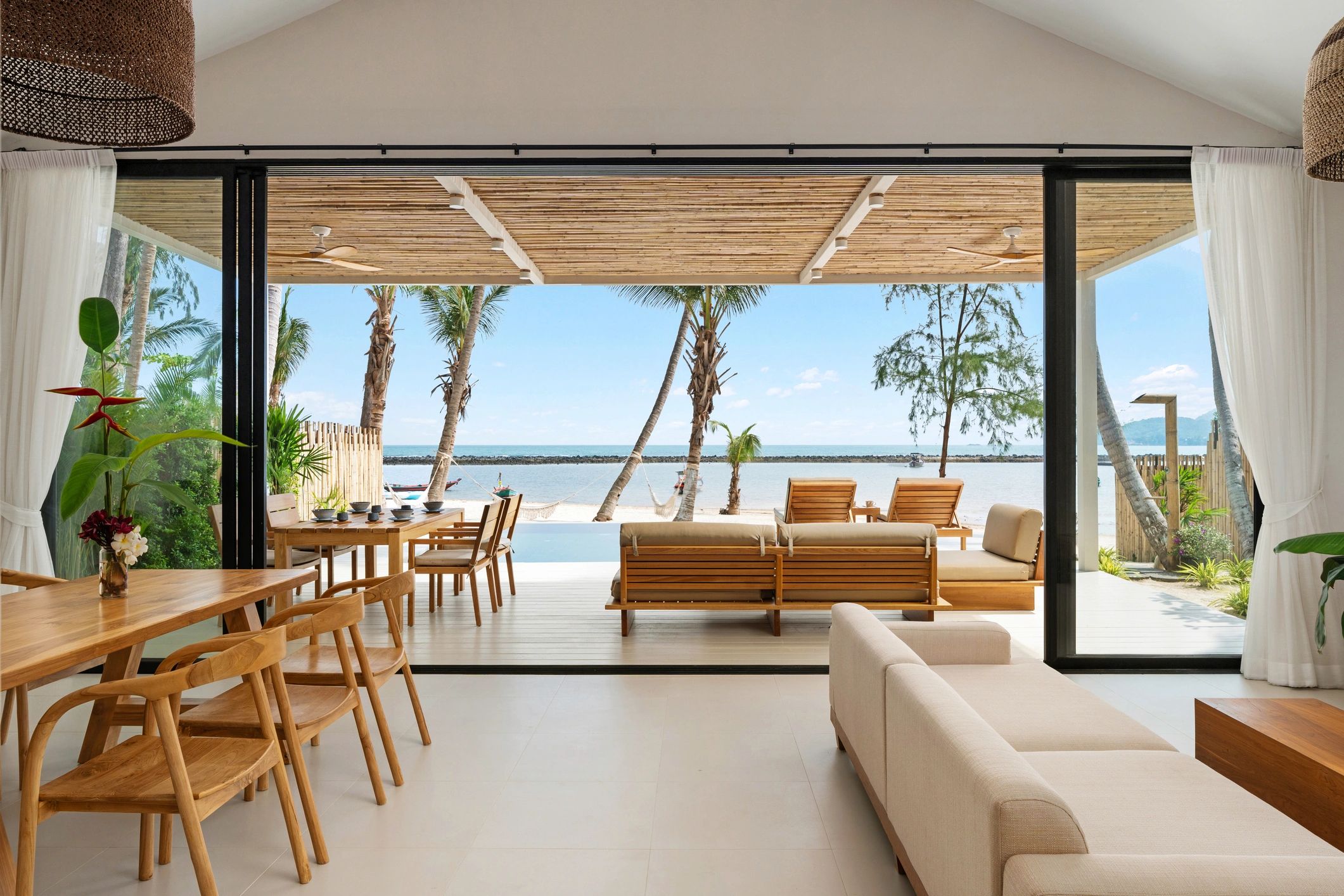 Modern living room and dining area with clean, contemporary finishes